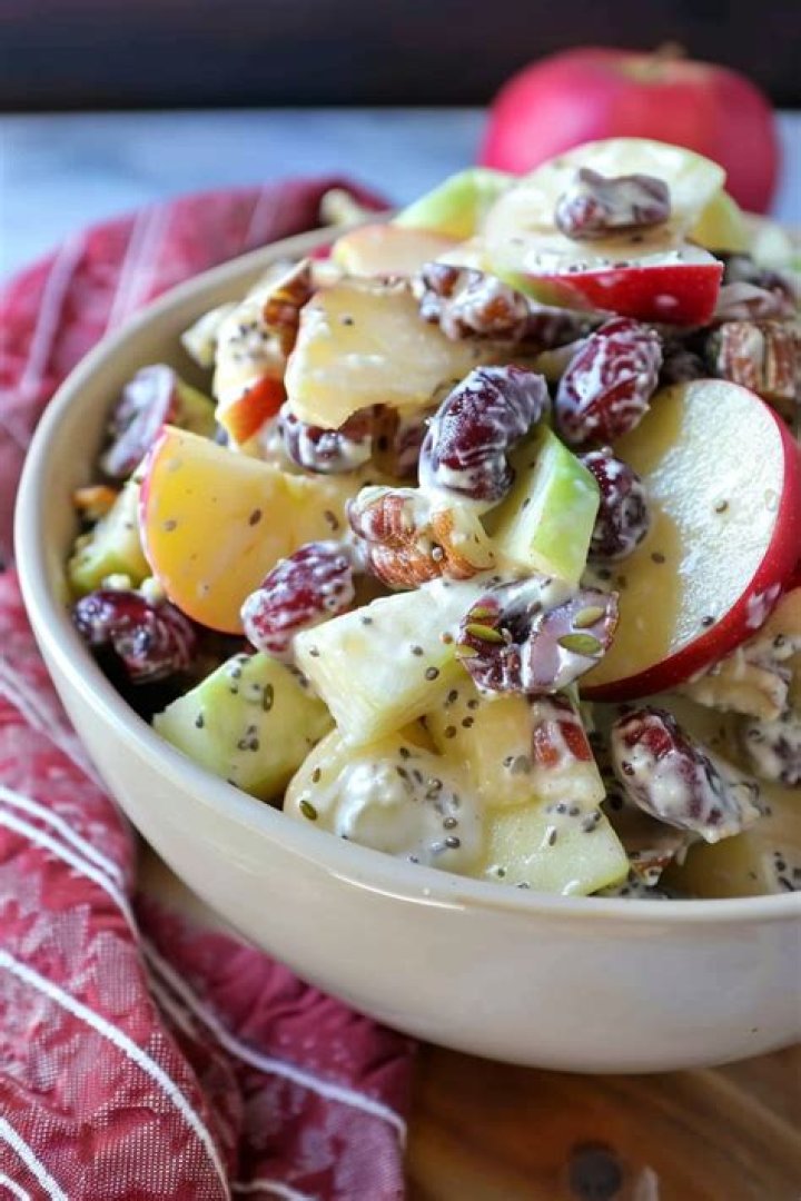 What salad is made from diced apples celery and walnuts in mayonnaise?